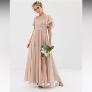 ASOS bridesmaids dress. Only worn once, no alterations made. Color: soft blush